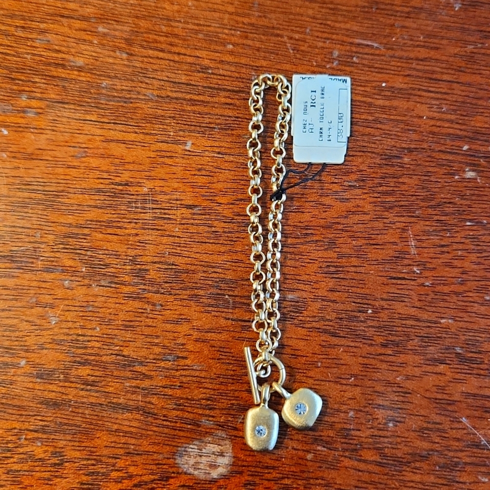 Gold charm toggle bracelet. Chain about 6 inches long.